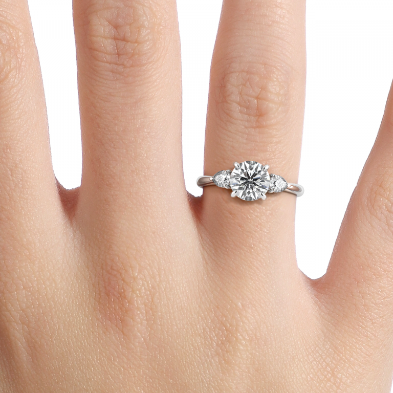 Round Three Stone Engagement Ring