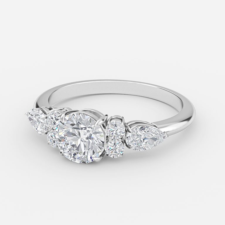 Round Three Stone Engagement Ring