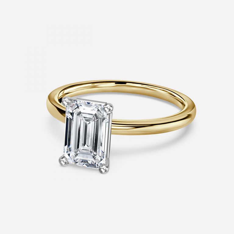 Emerald Two Tone Solitaire Engagement Ring