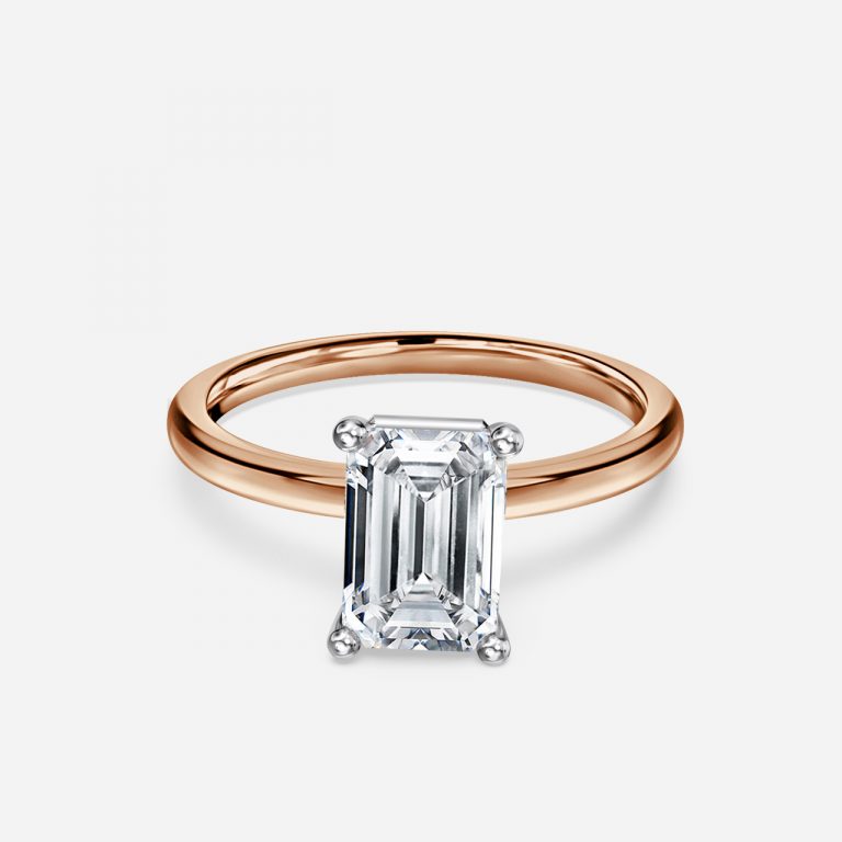 Emerald Two Tone Solitaire Engagement Ring