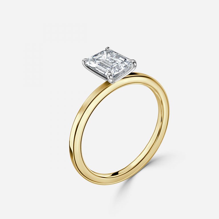 Emerald Two Tone Solitaire Engagement Ring
