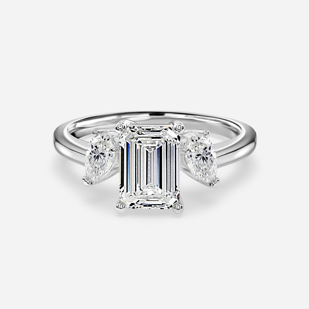 Emerald Three Stone Engagement Ring