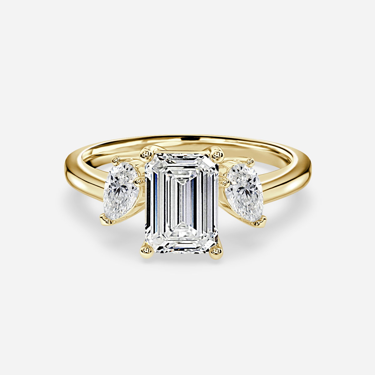 Emerald Three Stone Engagement Ring
