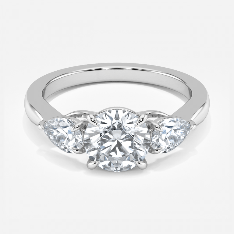 Round Three Stone Engagement Ring