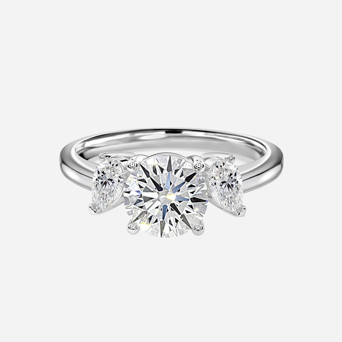 Round Three Stone Engagement Ring