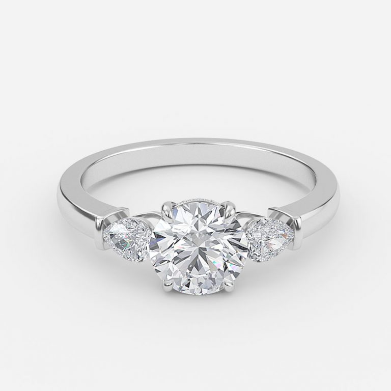 Round Three Stone Engagement Ring