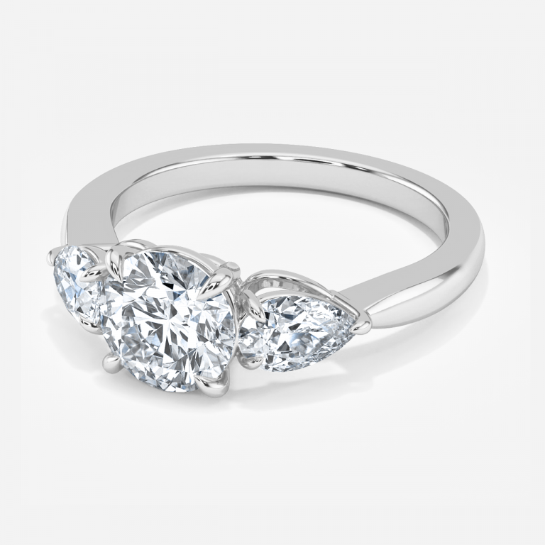 Round Three Stone Engagement Ring