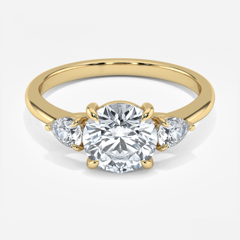 Round Three Stone Engagement Ring
