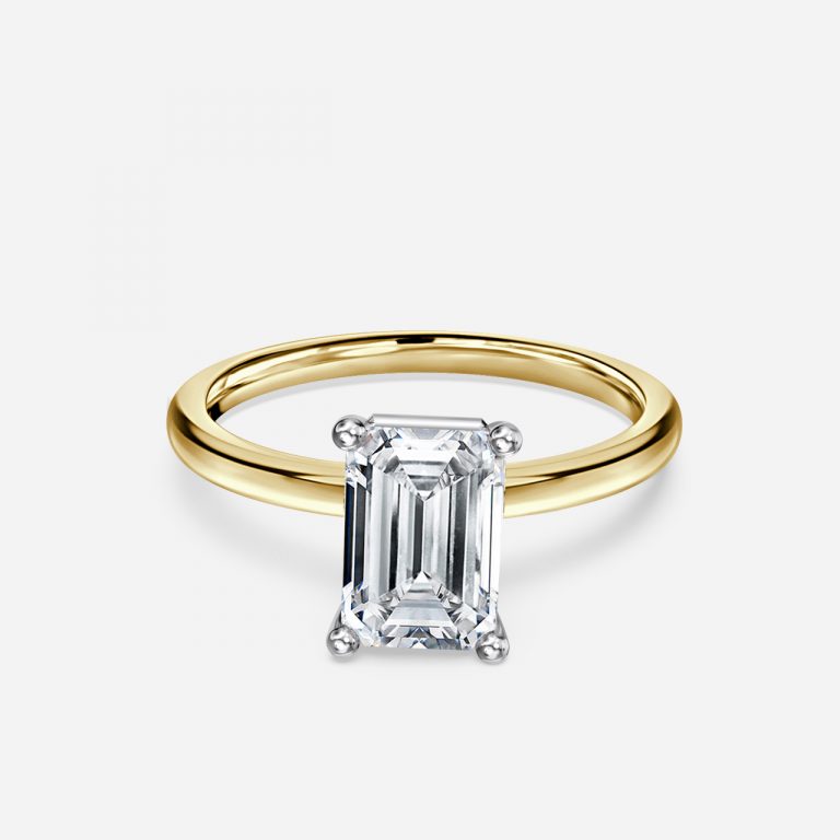 Emerald Two Tone Solitaire Engagement Ring