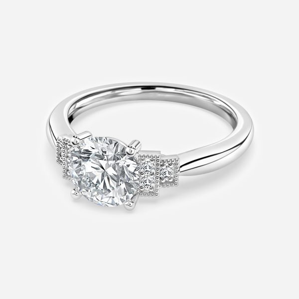 Round Three Stone Engagement Ring