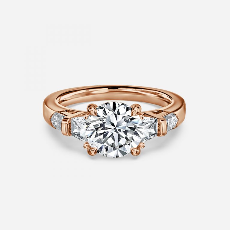 Round Three Stone Engagement Ring