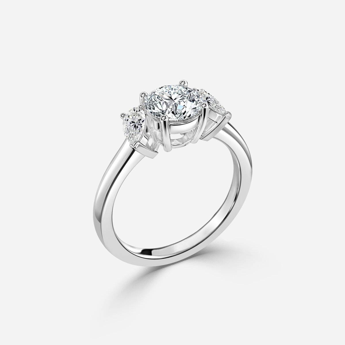 Round Three Stone Engagement Ring