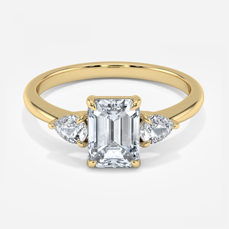 Emerald Three Stone Engagement Ring