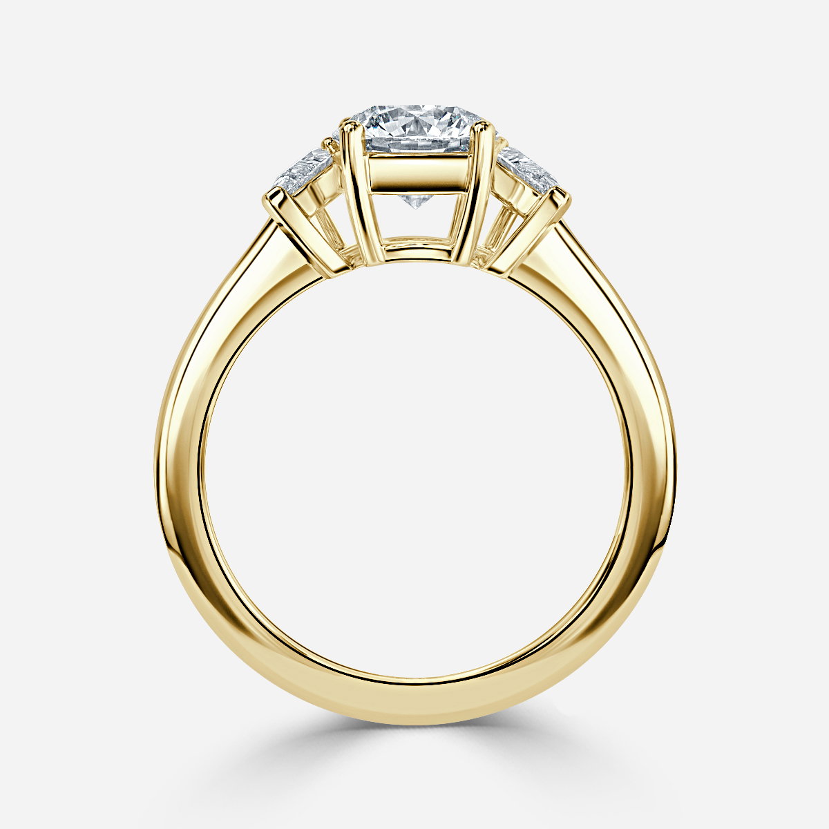 Round Three Stone Engagement Ring